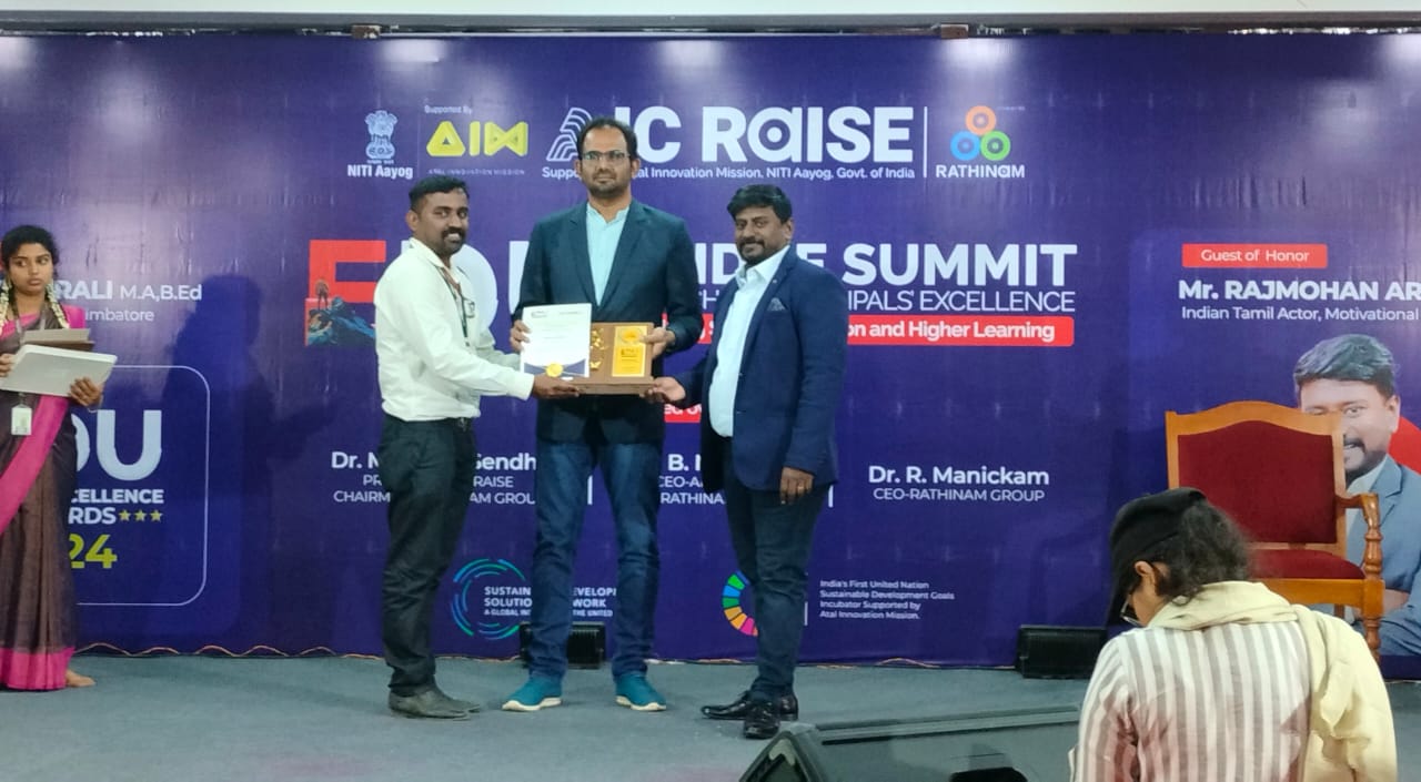 Founder of N-1729 Academy receiving the EDU Excellence Award at the AIC RAISE Summit